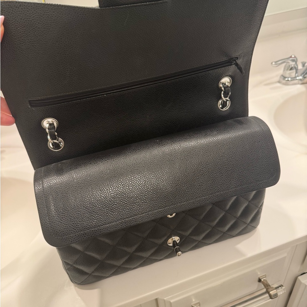 Chanel Black Quilted Shoulder Bag with Iconic CC Closure Silver hardware - Picture 10 of 16